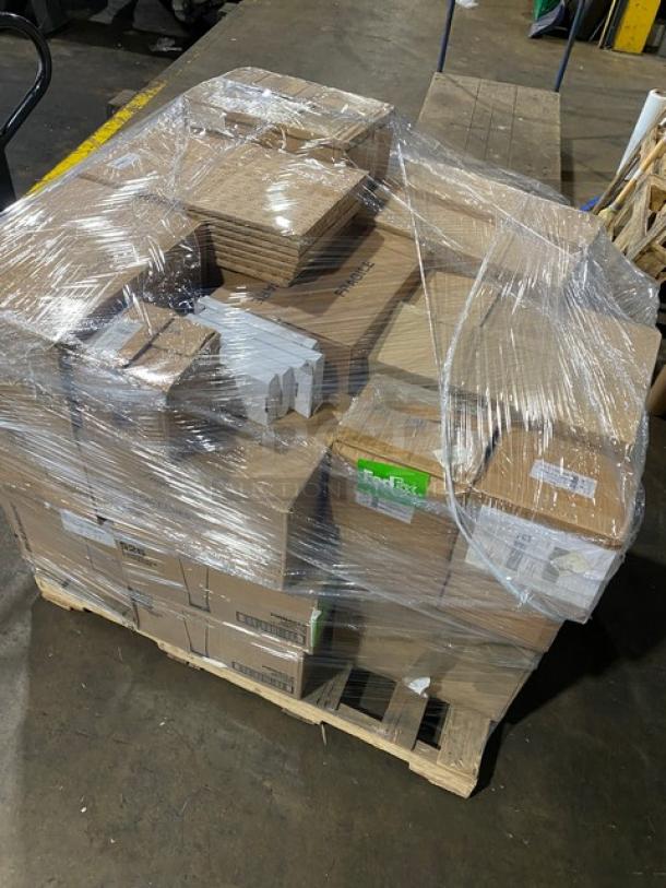 Mixed pallet containing various commercial items including Libbey beer glasses, Diversified Ceramics dishes, and more, shrink-wrapped.