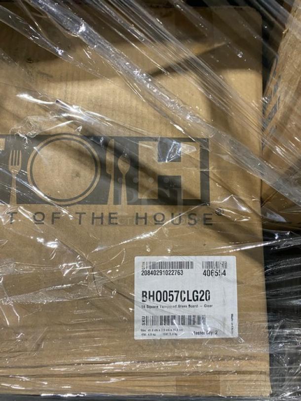 Mixed pallet of commercial kitchenware, including FOH tempered glass board labeled BHO057CLG20, wrapped in plastic.