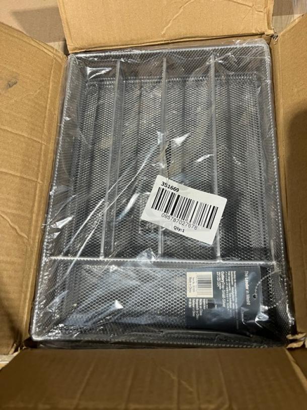 Mixed pallet in open box, featuring various commercial items. Visible barcode labeled 351669. Items in packaging.