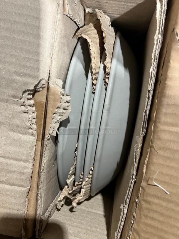 New mixed pallet, open box; visible G.E.T. white oval platter, 18”x13.5”, Model OP-618-W. Items packaged securely in cardboard.