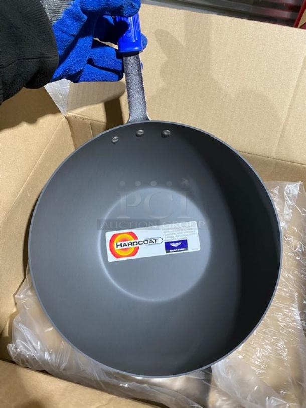 Brand new Vollrath Wear-Ever 11.5" Aluminum Stir Fry Pan, model H4015, with blue grip handle and HardCoat label.