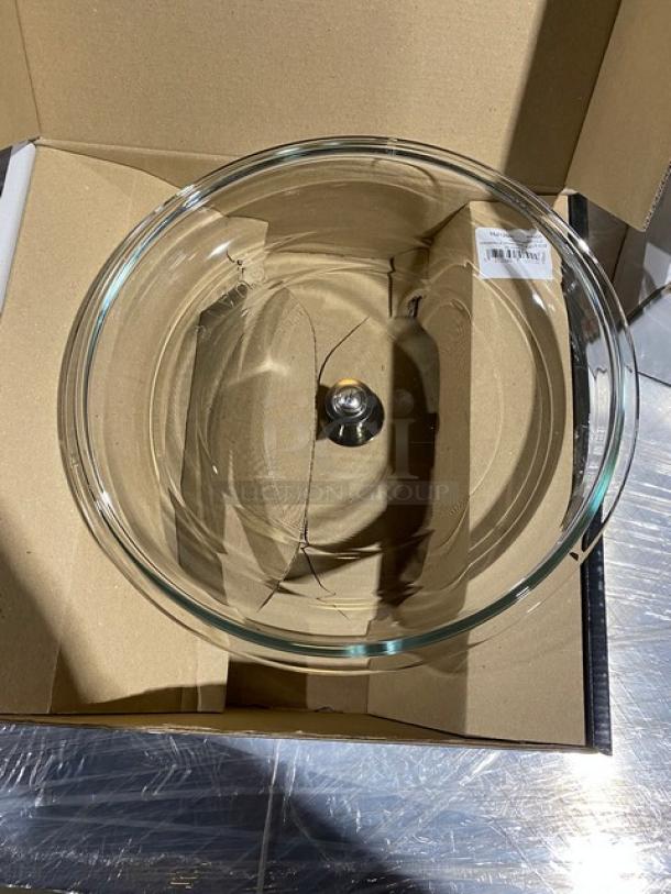 Brand new Staub clear domed glass lid, model W4208. Features metal knob. Packaged in original box.