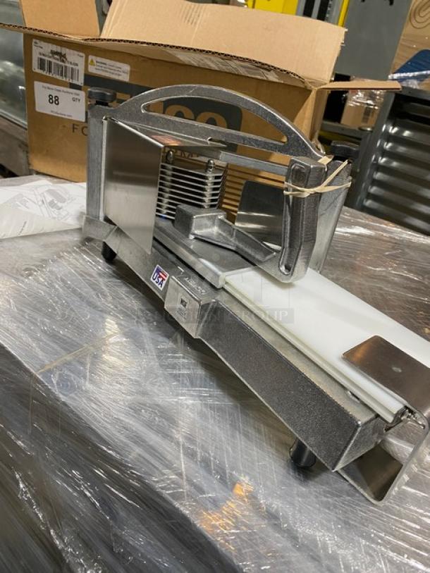 Brand new Nemco Easy Tomato Slicer II, model 56600-2, with 1/4" slicing cartridge, features legs for stability.