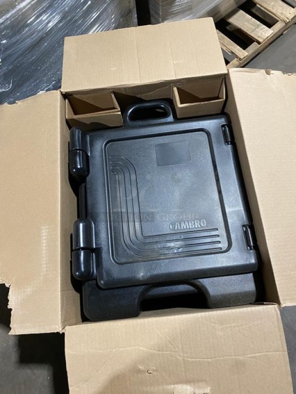 Brand new Cambro Ultra Camcarrier 1318CC, black insulated food pan carrier, front-loading, in original box.