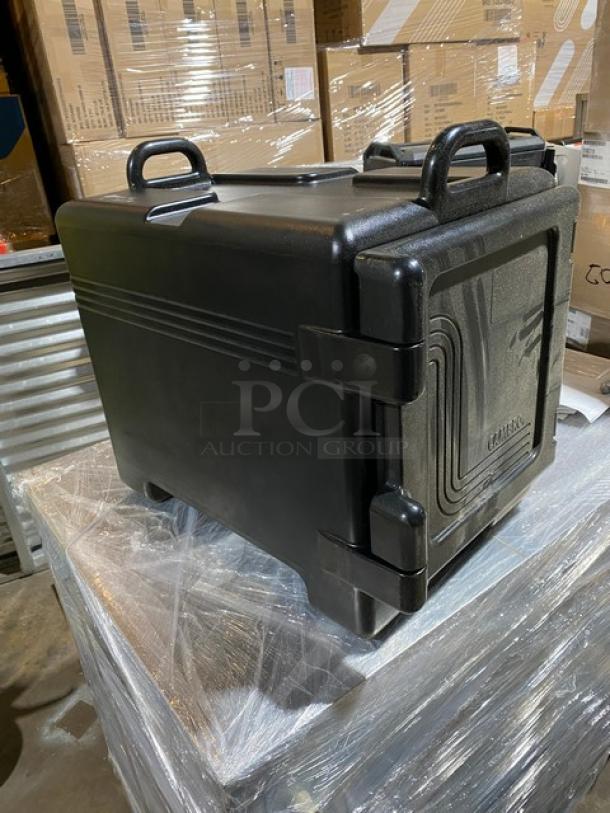 Brand new Cambro Ultra Camcarrier 1318CC, black insulated food pan carrier, front-loading, durable design.