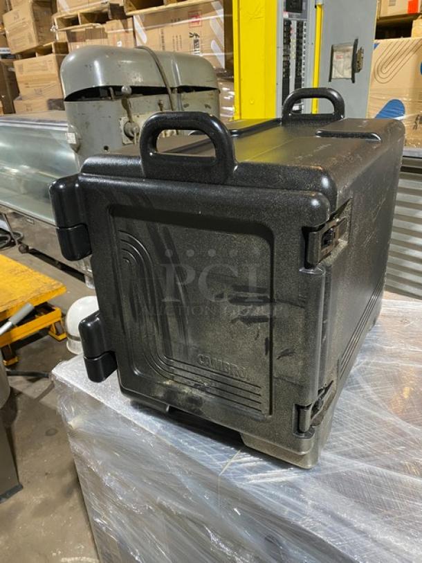 Brand new Cambro Ultra Camcarrier 1318CC, black insulated food pan carrier; durable front-loading design.