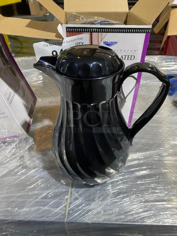 Brand new Vollrath Swirlserve black insulated beverage server; commercial-grade, tilt & pour design. Box and labels visible.