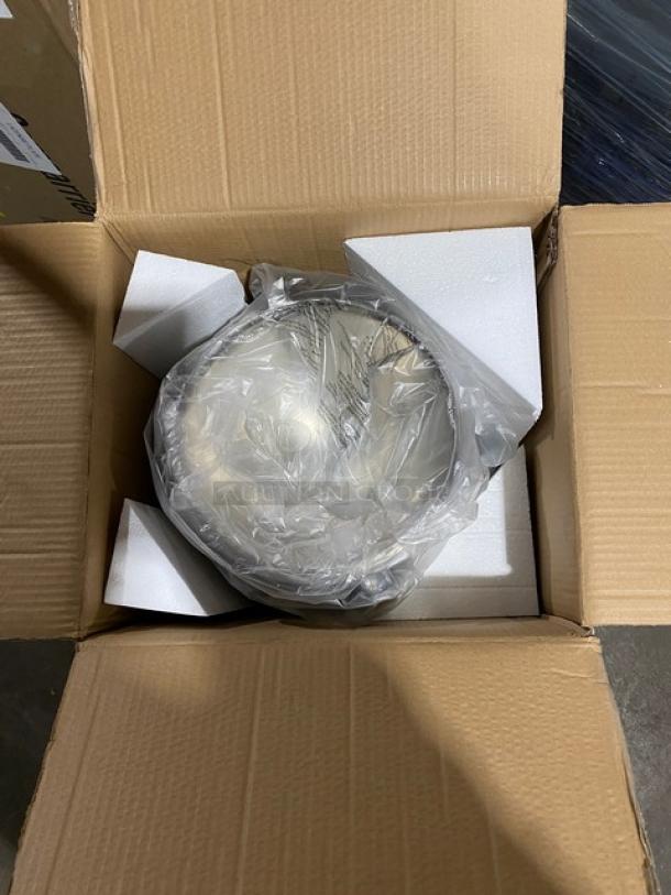 Brand new Winco Virtuoso 5 Gal. coffee urn, model 905B, with mirror shine finish, in box with fuel holder base included.