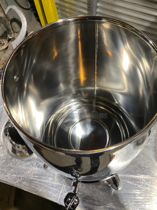 Brand new Winco Virtuoso 5-gallon coffee urn, stainless steel, mirror finish, with fuel holder base, Model 905B.