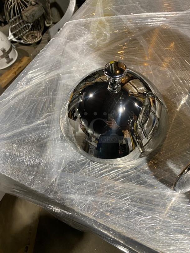 Brand new Winco Virtuoso Series 5 Gal. coffee urn, Model 905B, stainless steel mirror finish, with fuel holder base.