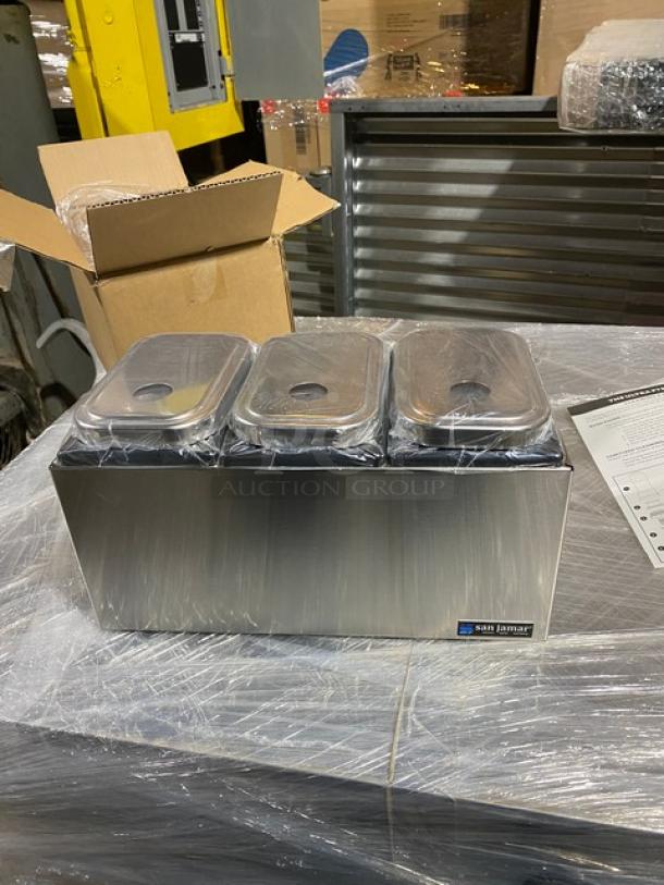 Brand new San Jamar P7500 stainless steel 3-well condiment pump center. Includes Ultra Condiment Pumps, pristine condition.