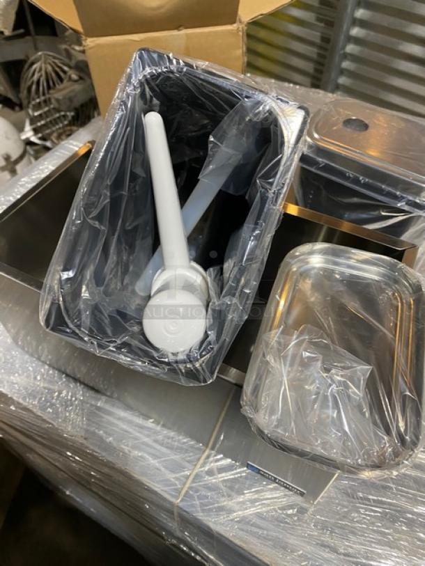 San Jamar Model P7500 new 3-well condiment pump service center, stainless steel, includes ultra condiment pump, in packaging.