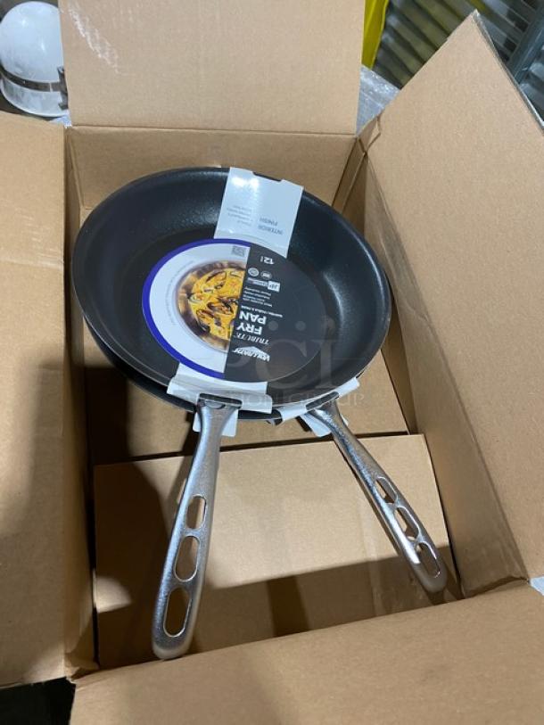 Brand new Vollrath Tribute Series 12" induction-ready fry pan, model 691412, with Ever-Tite handled grip.