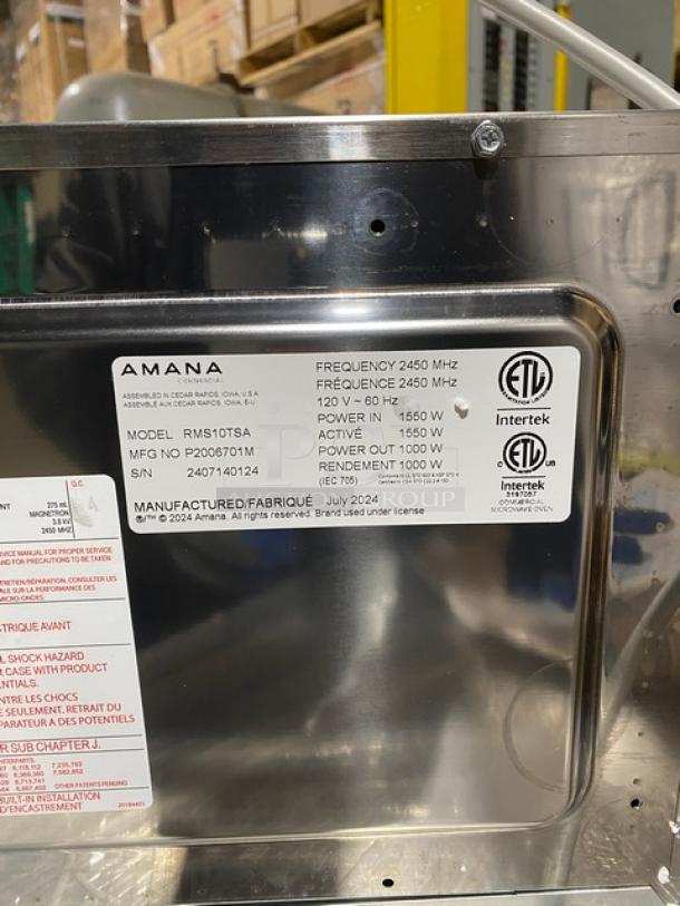 Brand new Amana RMS10TSA commercial stainless steel 1000W microwave oven. Features digital push-button control, 120V, on legs.