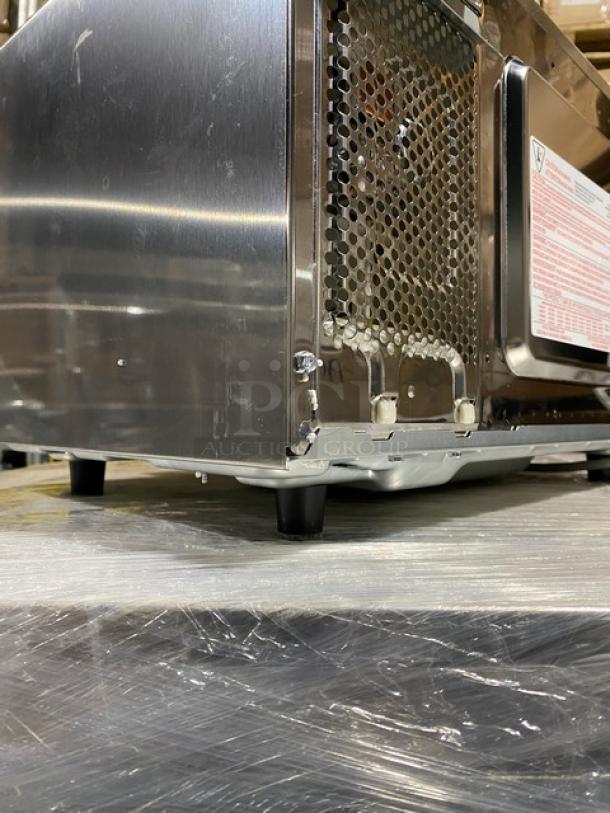 Amana RMS10TSA stainless steel countertop microwave, 1000W, brand new, with digital controls, on legs, 120V.