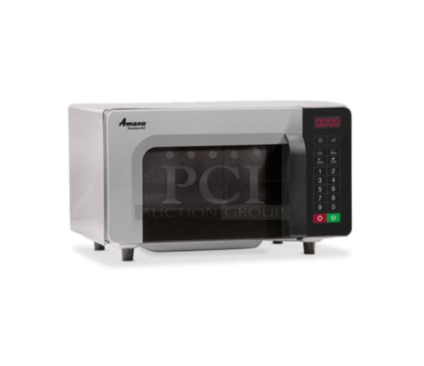 Brand new Amana RMS10TSA stainless steel 1000W commercial microwave oven on legs, featuring digital controls.