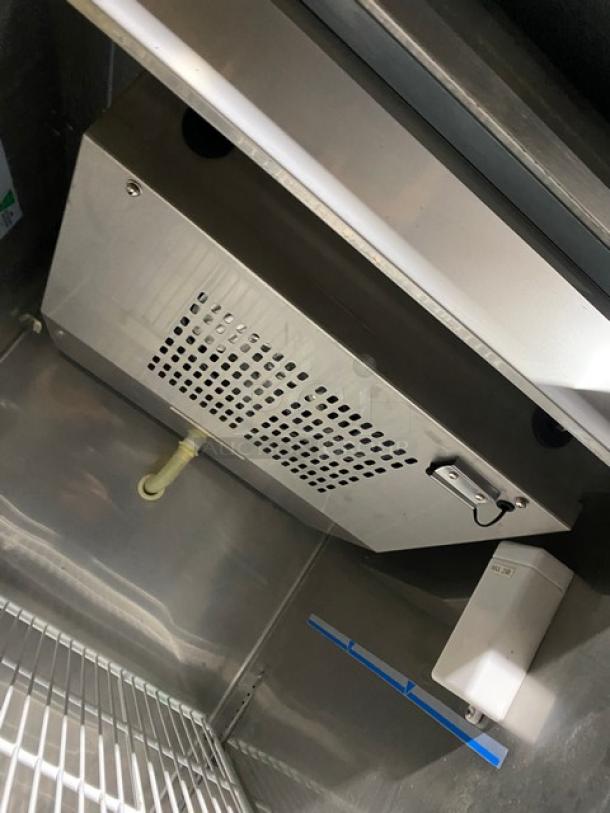 Centaur Plus Series stainless steel reach-in refrigerator, Model CSD-1DR-TSI-ES, with poly coated wired rack. Used condition.