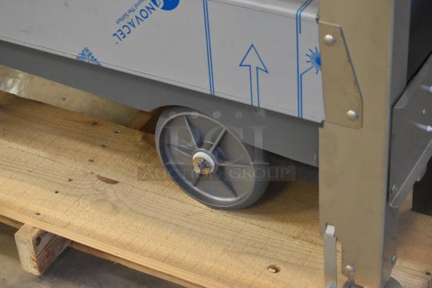 Stainless steel Scotsman FS1222A-32B flake ice machine head on ICS730-A bin, scratch and dent, on pallet.