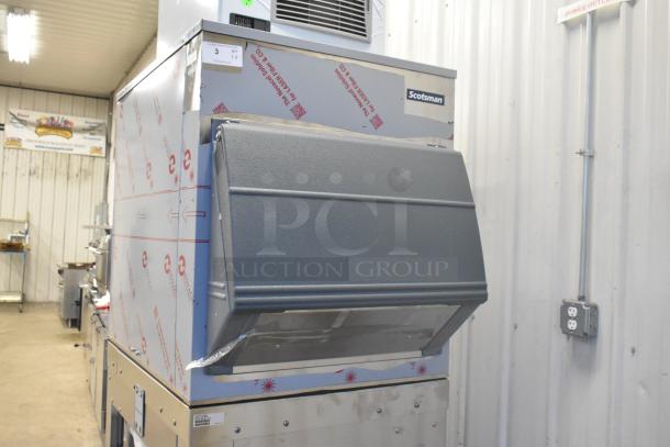 Brand new 2024 Scotsman FS1222A-32B flake ice machine on 2025 Scotsman ICS730-A storage bin. Stainless steel, 652 lb capacity.