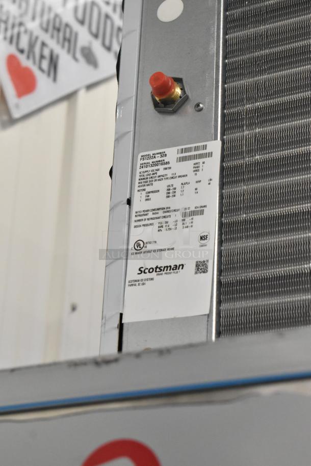 Scotsman FS1222A-32B ice machine head with manufacturer's label showing model and specs, mounted on ICS730-A bin.
