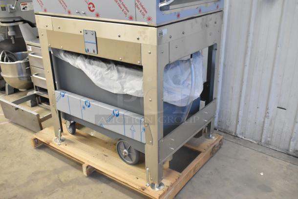 Brand new Scotsman FS1222A-32B commercial flake ice machine with ICS730-A stainless steel storage bin, 652 lb capacity.