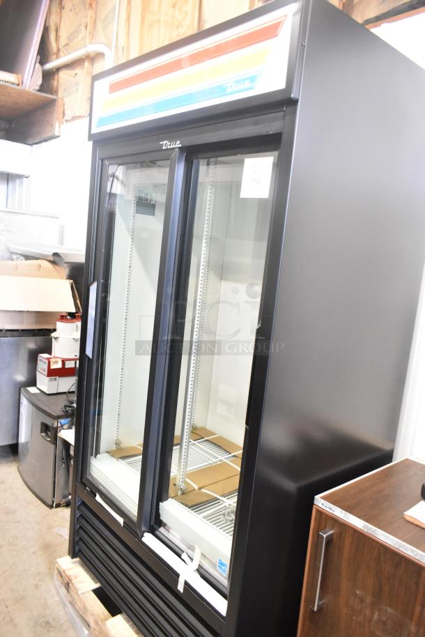Brand new True GDM-33-HC-LD commercial cooler, 2 glass doors, poly-coated racks, scratch and dent condition, 115V, 1 Phase.