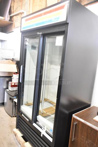 Brand new True GDM-33-HC-LD commercial cooler, 2 glass doors, poly-coated racks, scratch and dent condition, 115V, 1 Phase.