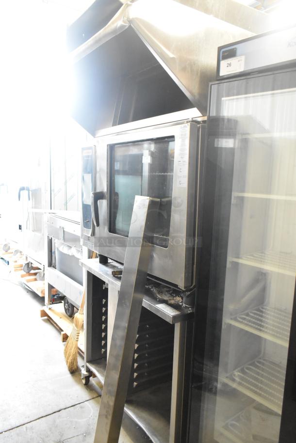 2019 Rational SCC WE 62 stainless steel combi convection oven with UltraVent Plus hood and double pan rack stand, 480V, 3-phase.