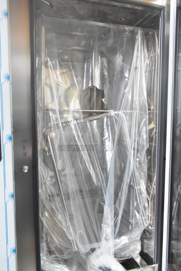 Stainless steel Henny Penny FPGM22172007 combi convection oven, new scratch and dent, with roll-in rack, 200,000 BTU.