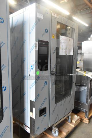 Brand new 2023 Henny Penny FPGM22172007 stainless steel gas combi convection oven, 200,000 BTU, with roll-in rack, minor dents.