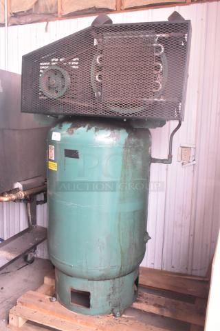 Champion VR10-12 metal reciprocating air compressor, commercial floor style, 460V, 3-phase. Used condition, visible wear.