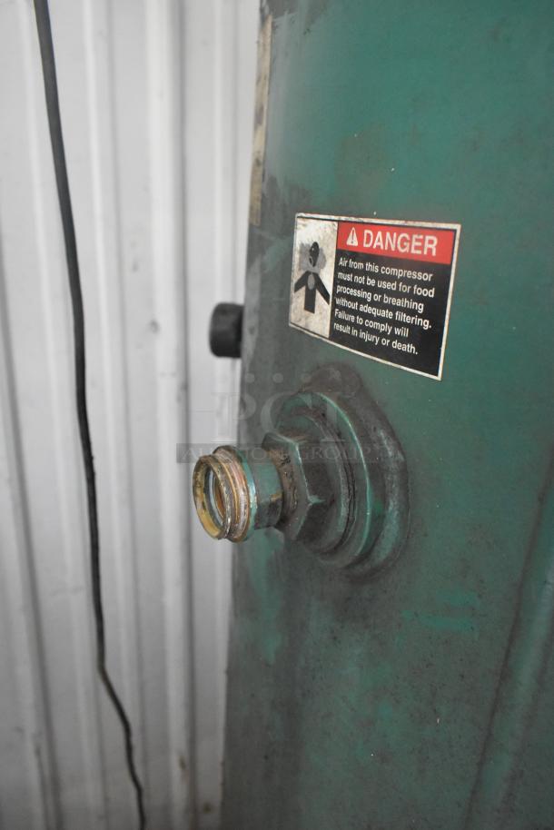 Champion VR10-12 air compressor, metal construction, commercial use, 460 volts, 3 phase. Warning label visible.