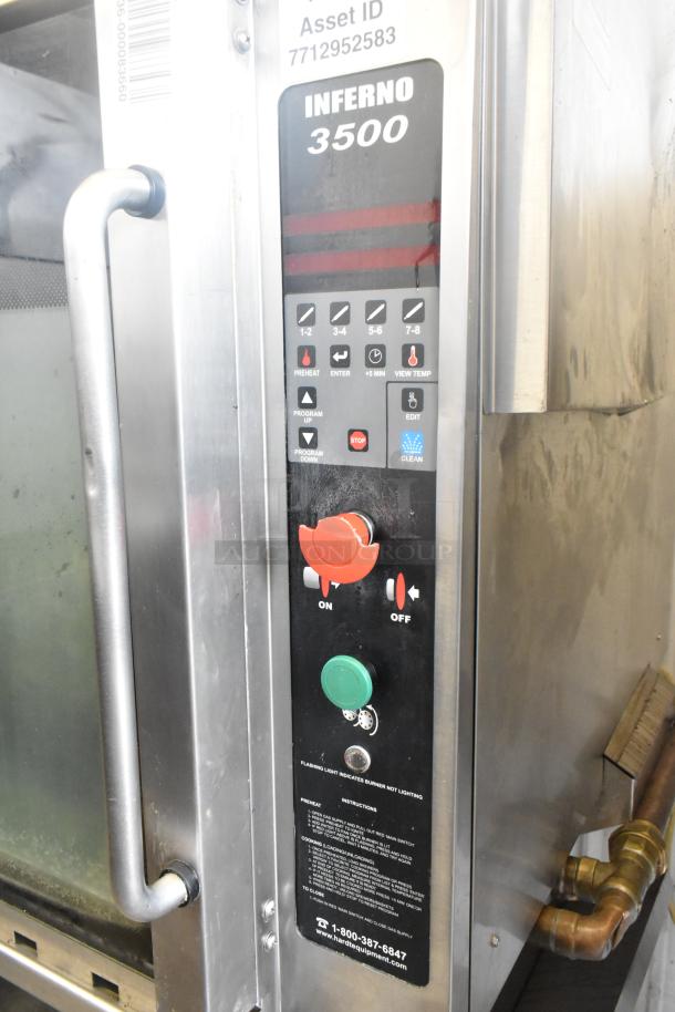 Hardt Inferno 3500 Stainless Steel Commercial Rotisserie Oven, controls panel shown, includes skewers, on casters.
