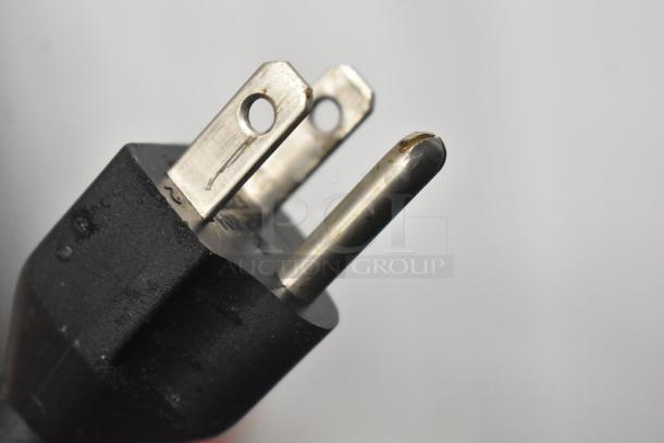 Alt text: Robot Coupe R2U metal food processor plug, compatible with 120V, 1-phase power. Close-up of plug prongs.