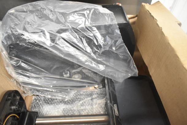 Brand new 2023 Hobart HTi-SSLSC metal commercial 30 lb. self-service scale with label printer, shown partially unwrapped.