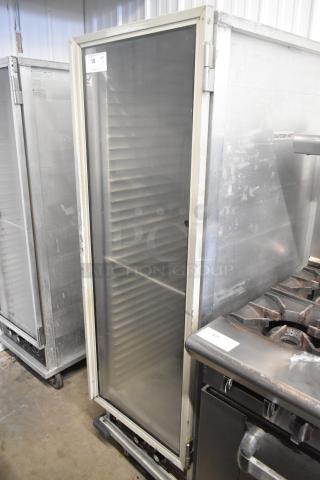 Win-holt metal commercial heated holding cabinet on casters, 115 volts, 1 phase. Sturdy construction, industrial use.