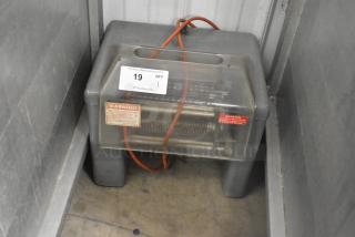 Metal commercial countertop electric meat tenderizer, 115 volts, 1 phase, visible caution labels.