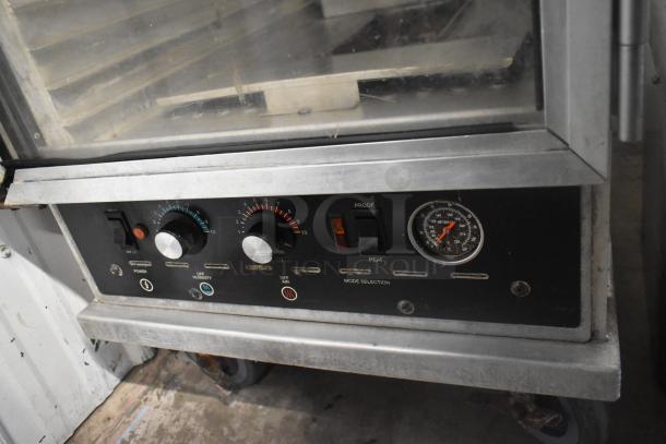 CresCor 118PH1834 heated holding cabinet on casters, controls include temperature dials and mode selection; 120V, 1 Phase.