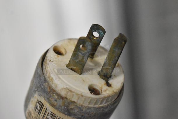 Close-up of a worn electrical plug with visible rust on CresCor 118PH1834 Heated Holding Cabinet, 120V, 1 Phase.