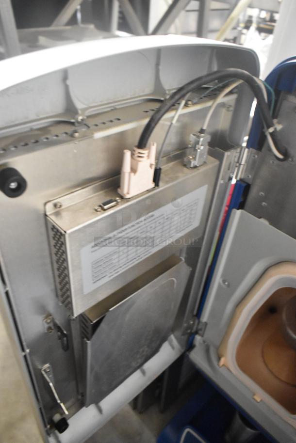 F'real FRLB4 metal commercial mixer, 120V, 1 phase, for milkshakes and frozen beverages, with internal wiring exposed.