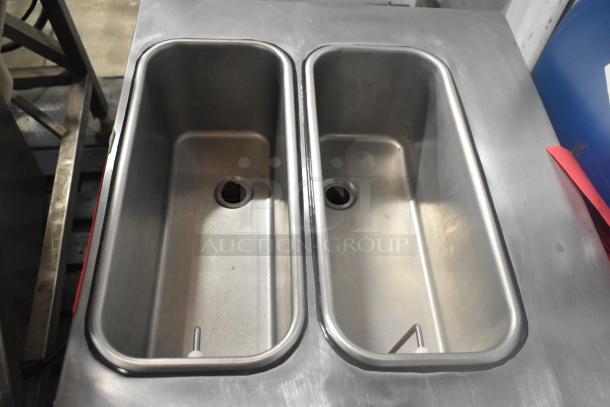 2021 Stoelting F131-38I2 stainless steel soft serve ice cream machine, 2-flavor with twist, in good condition.