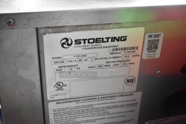 2021 Stoelting F131-38I2 stainless steel countertop soft serve machine label, 208-240V, 2 flavors plus twist, model and power specs shown.
