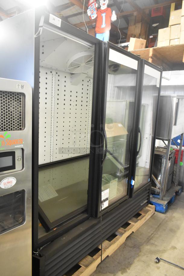 True FLM-81F 2025 metal commercial 3-door reach-in freezer merchandiser with poly-coated racks, 115 volts, 1 phase.