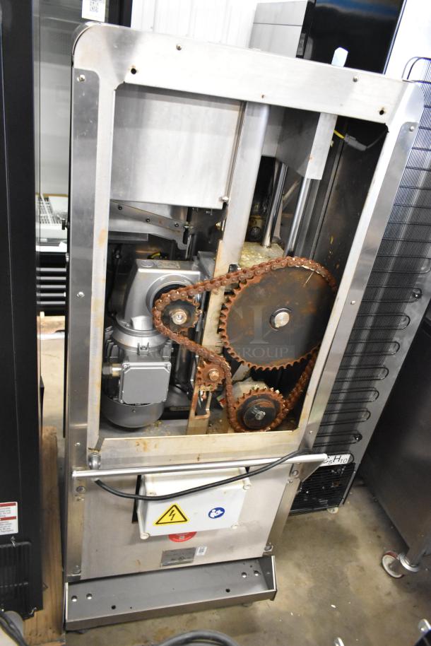 LATE MODEL JBT 2ND-GEN-MFJ-HE stainless steel citrus juicer. Commercial floor style on casters. 115V, 1 phase.