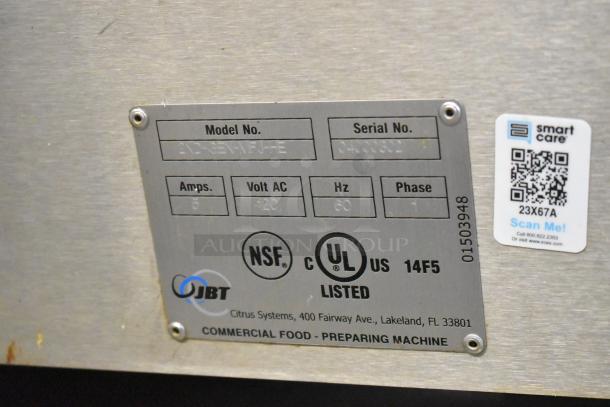Stainless steel JBT 2ND-GEN-MFJ-HE citrus juicer label, showing model and serial number, with NSF and UL certifications.
