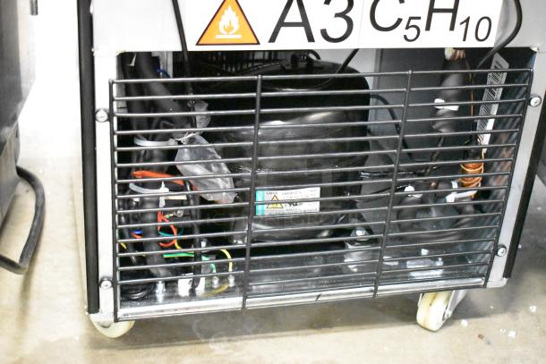 BRAND NEW KoolMore KM-MDF-17S Slim Commercial Merchandiser Freezer, manual defrost, 6.5 Cu. Ft., 115V, visible internal components.