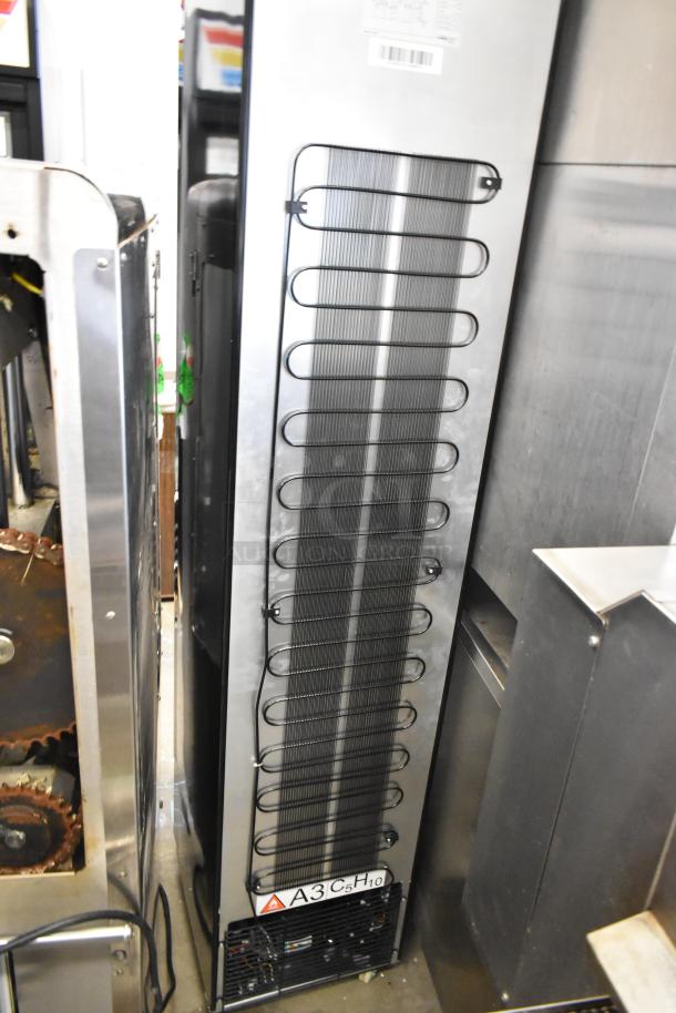 KoolMore KM-MDF-17S freezer, 6.5 Cu. Ft., manual defrost, slim design, scratch, and dent, model info visible on label.