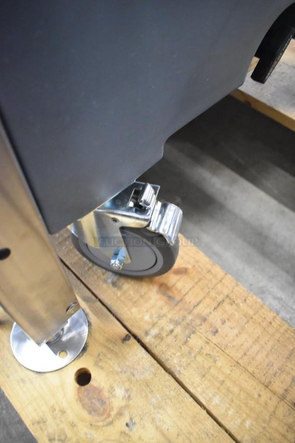 BRAND NEW Folletet LQ1BASE Ice Bin Transport System, features sturdy caster wheels, minor scratches on base.