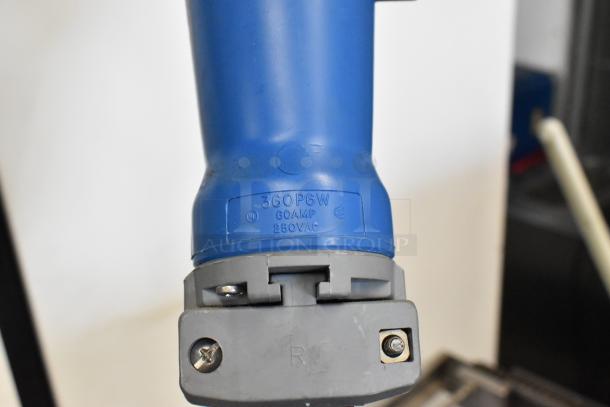 Power plug labeled "360P6W, 60 AMP, 250 VAC," showing its electrical specifications.