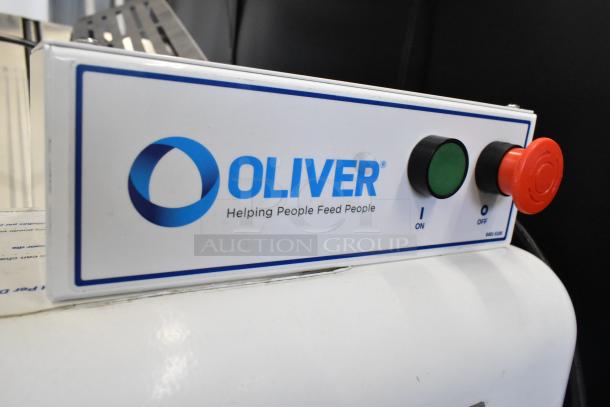 Oliver 797-32NC bread loaf slicer, metal, commercial floor style, 115 volts, 1 phase, with control panel showing brand logo.